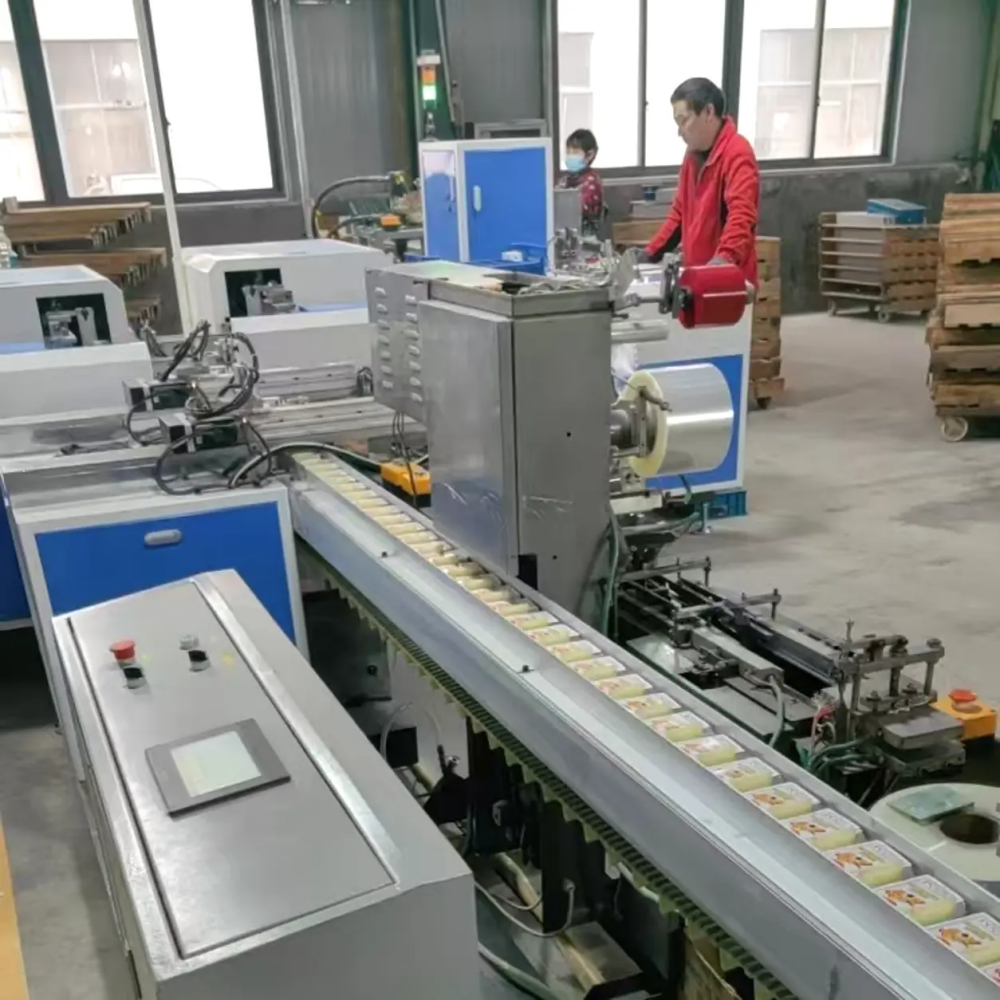 Automated packaging line packing finished custom playing card decks