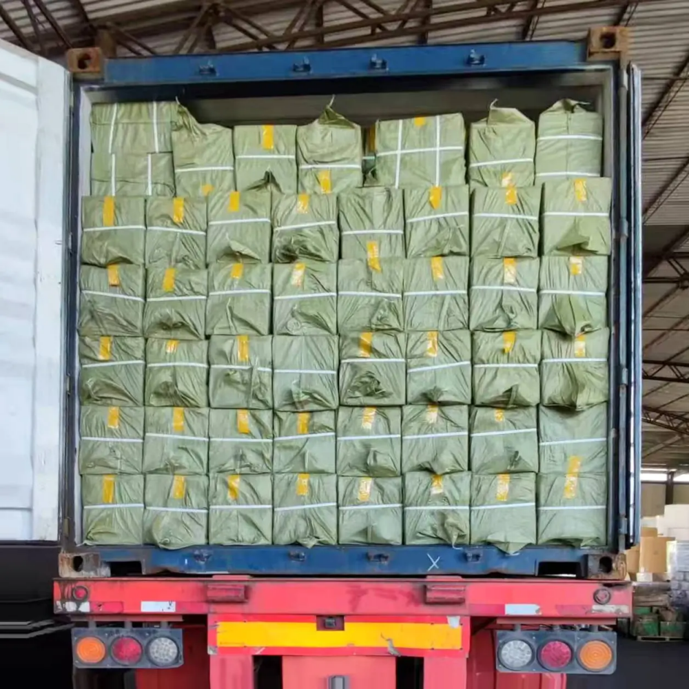 Export cartons of custom playing cards loaded into a shipping container